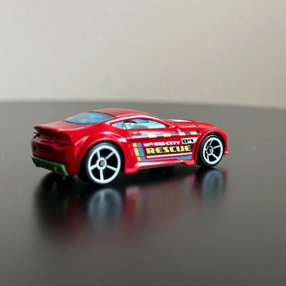 2009 HOT WHEELS TORQUE TWISTER #04 HW RESCUE RED 1:64 DIECAST 2.5" CAR - Picture 2 of 13